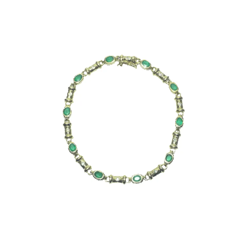 Bracelet en or jaune 18 carats 10,94 g avec pierres vertes sold by 58 Facettes