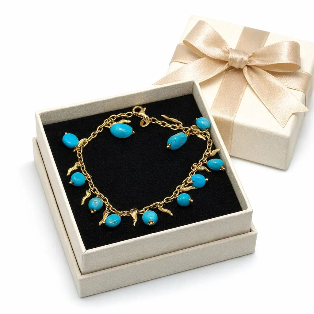 Bracelet en or jaune avec perles turquoise et breloques décoratives sold by 58 Facettes product image thumbnail 3