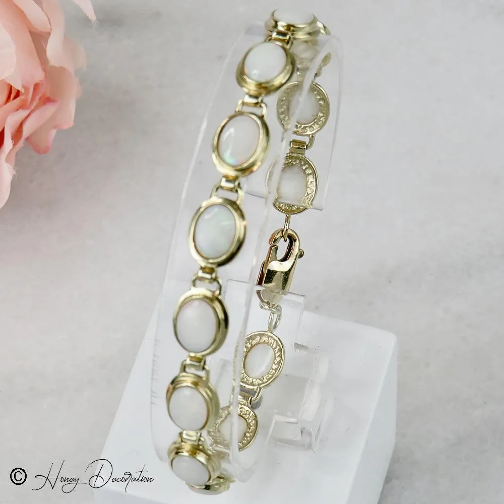 Bracelet vintage en or jaune 14 carats et opales sold by 58 Facettes product image thumbnail 5