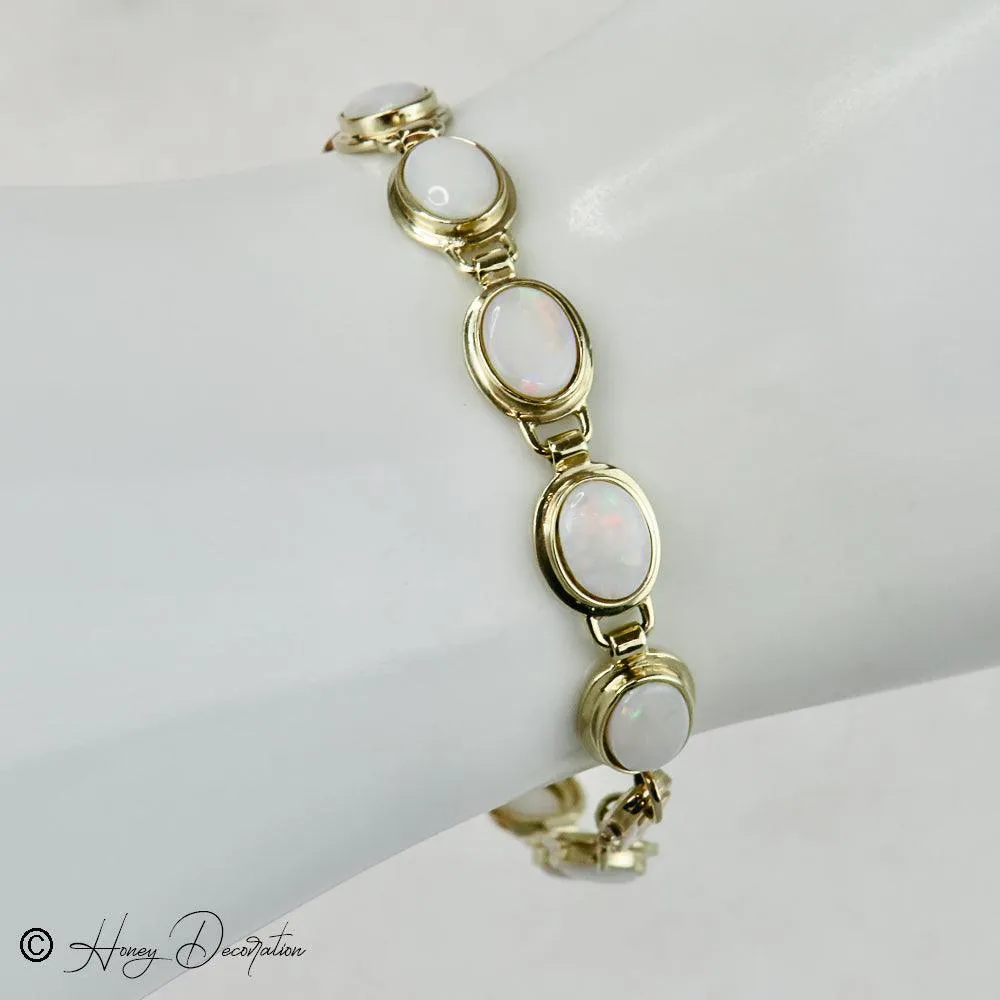 Bracelet vintage en or jaune 14 carats et opales sold by 58 Facettes product image thumbnail 2