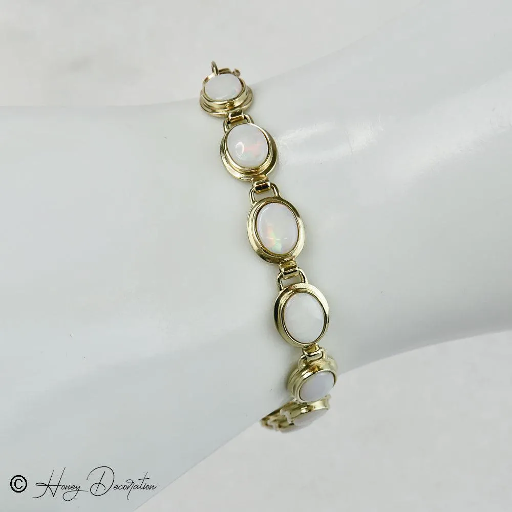 Bracelet vintage en or jaune 14 carats et opales sold by 58 Facettes product image thumbnail 3