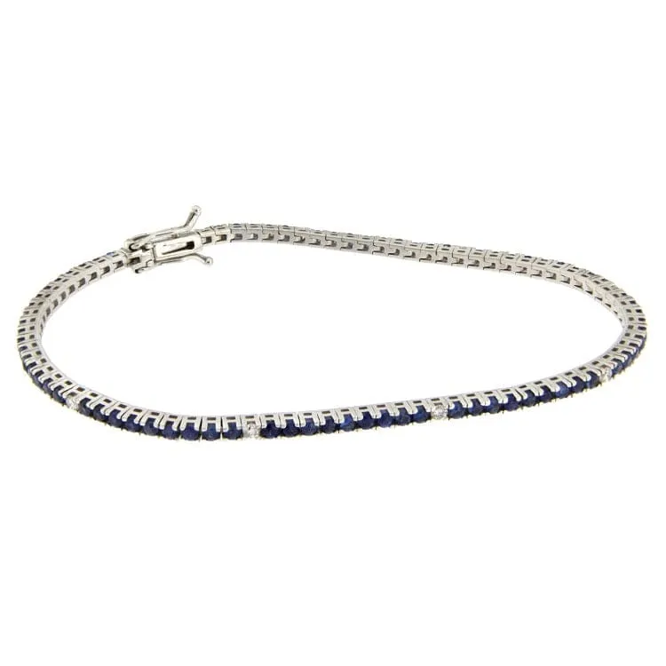 Guidetti - Bracelet tennis en or blanc avec saphirs et diamants sold by 58 Facettes