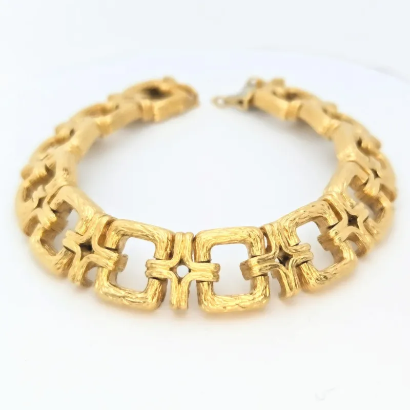 Bracelet en or jaune 18 carats à maillons ciselés made by 58 Facettes