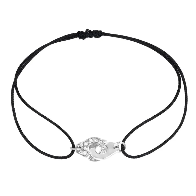 Dinh Van Menottes R8 - Bracelet sur cordon en or blanc et diamants sold by 58 Facettes