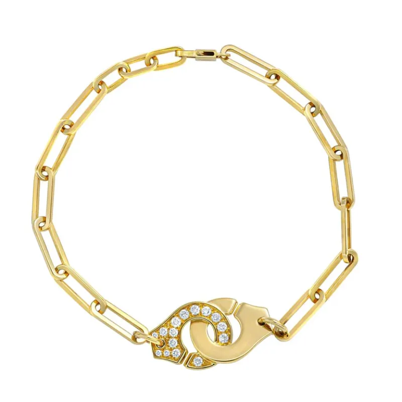 Dinh Van Menottes R12 - Bracelet en or jaune et diamants made by 58 Facettes