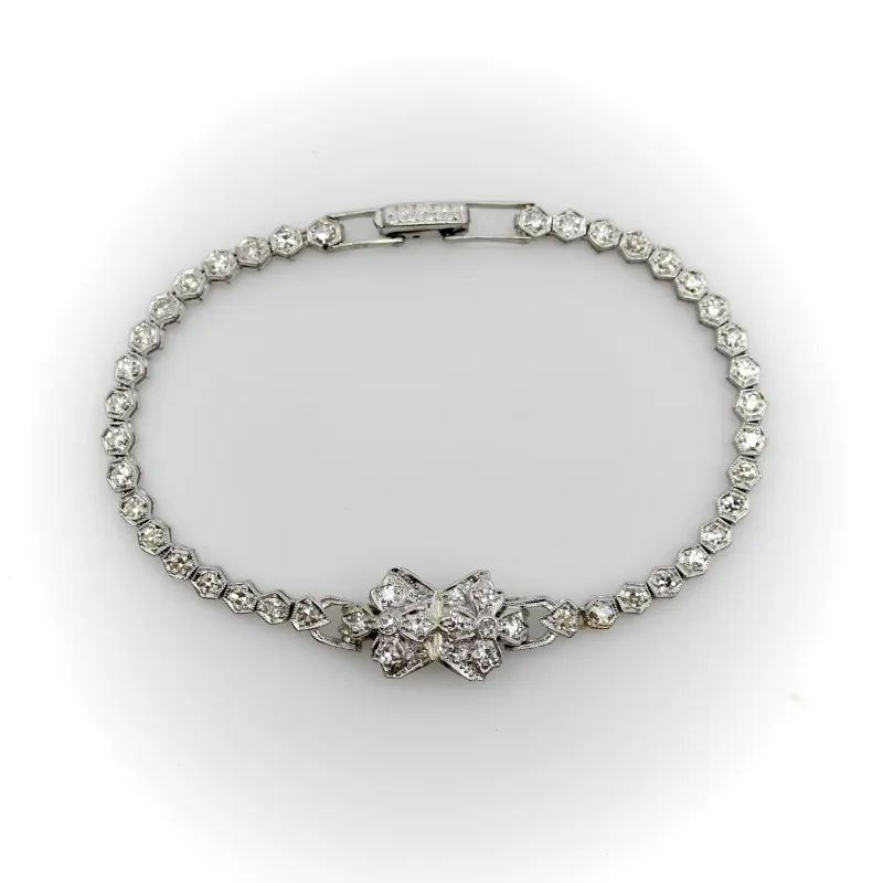 Art déco - Bracelet ligne fleur en platine et diamants sold by 58 Facettes