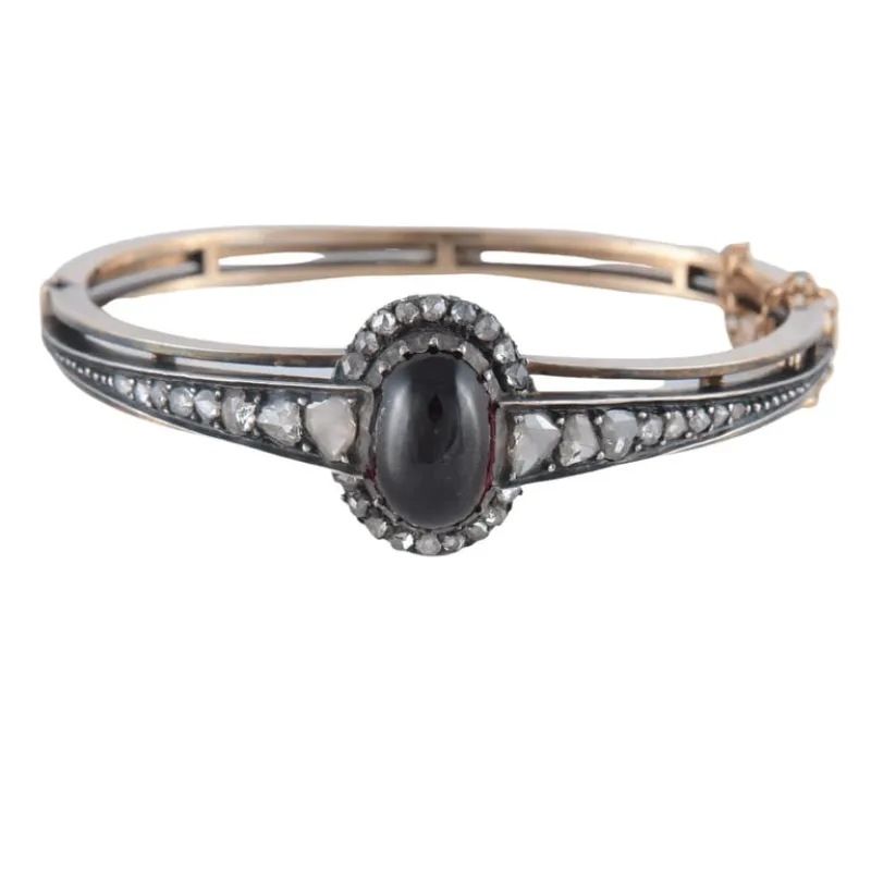 Bracelet en or et argent au grenat cabochon et diamants made by 58 Facettes