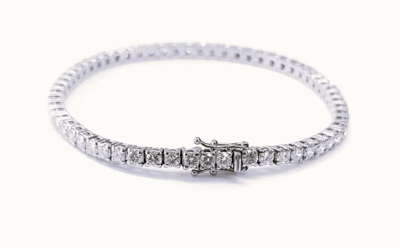Bracelet tennis rivière en or blanc 18k et diamants made by 58 Facettes