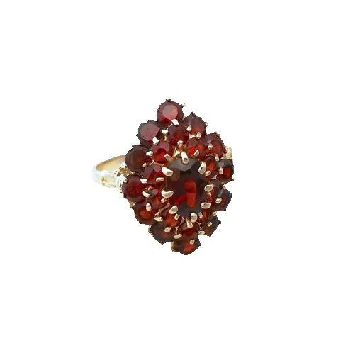 Bague marquise en or jaune 18K sertie de grenats sold by 58 Facettes
