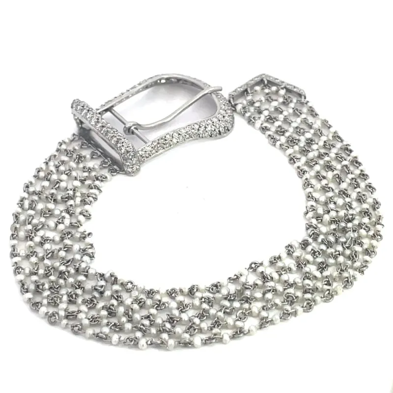 Bracelet boucle - Bracelet en platine perles et diamants made by 58 Facettes