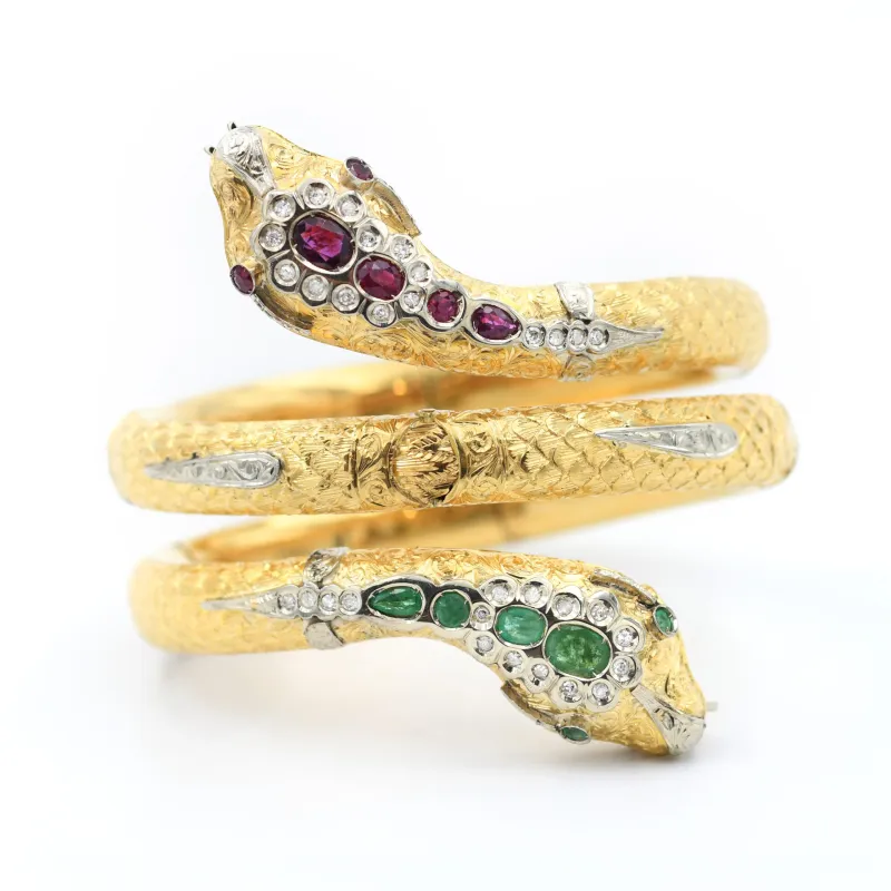 Bracelet serpent Tubogas en or jaune serti de diamants, de rubis et d'émeraudes made by 58 Facettes