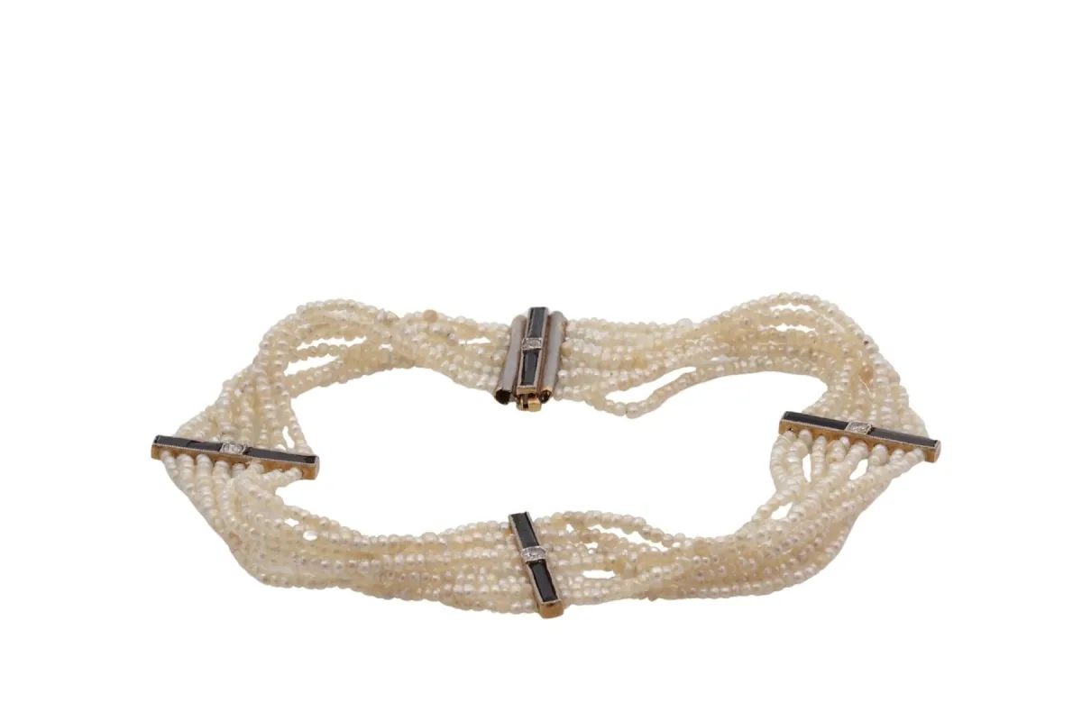 Bracelet ancien en or 18k avec perles fines, onyx et diamants made by 58 Facettes