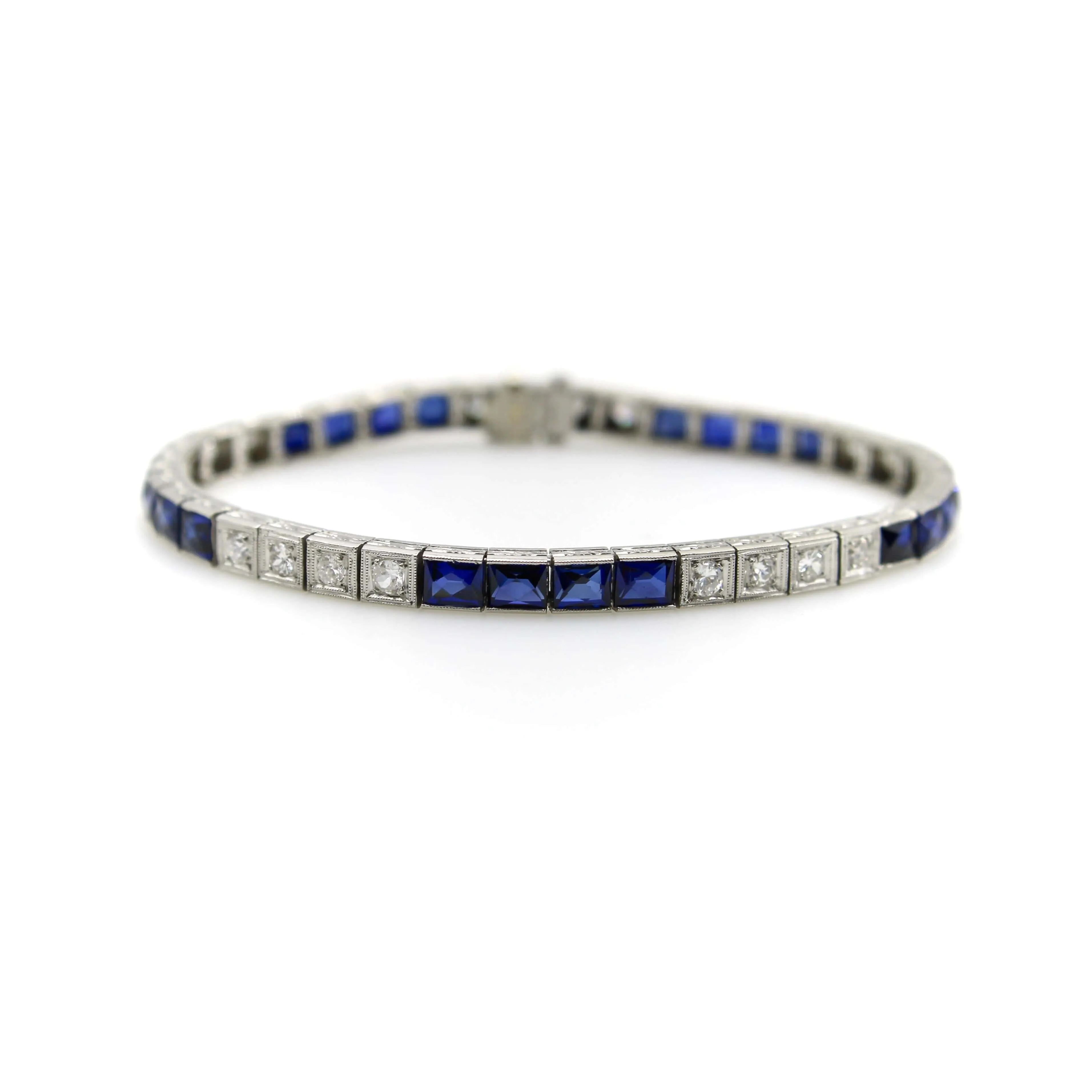 Art déco - Bracelet ligne en platine, diamants et saphirs sold by 58 Facettes