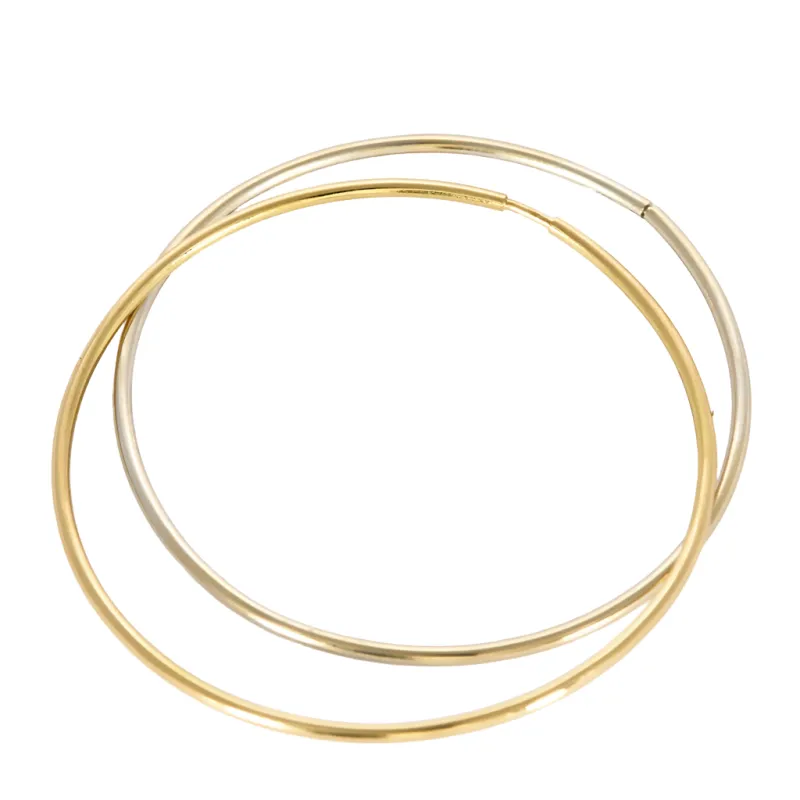 Deux bracelets jonc en or jaune et or blanc made by 58 Facettes