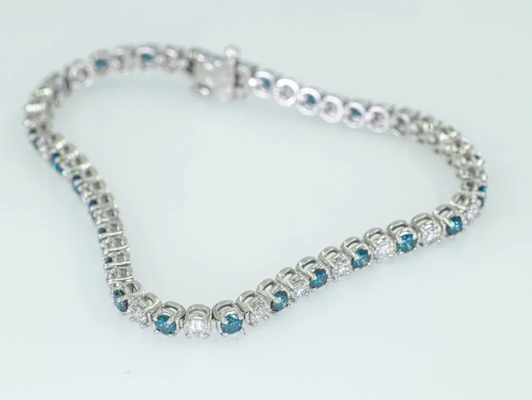 Bracelet tennis en or blanc 14 ct et diamants 2,70 ct made by 58 Facettes