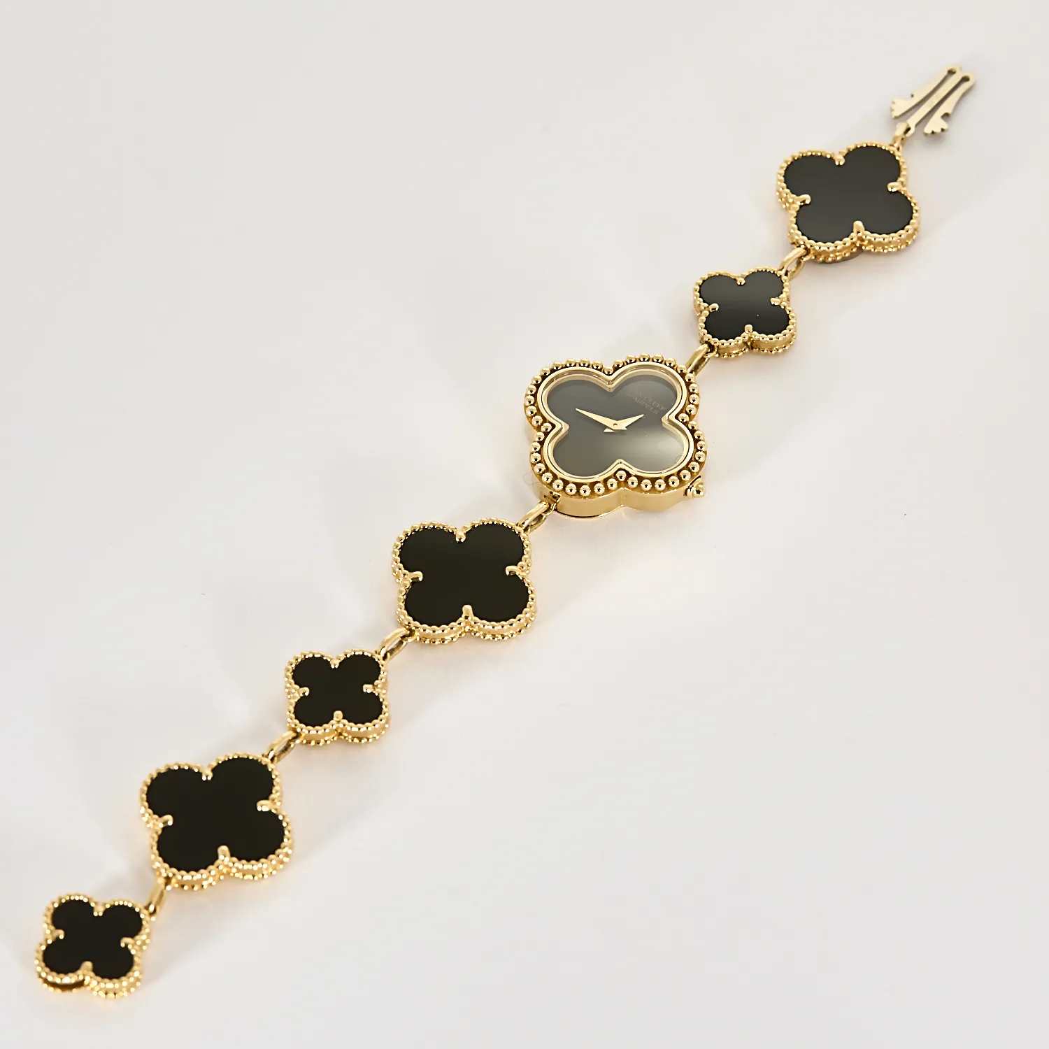 VAN CLEEF & ARPELS - Alhambra - Montre bracelet de dame en or jaune et onyx sold by 58 Facettes product image thumbnail 4