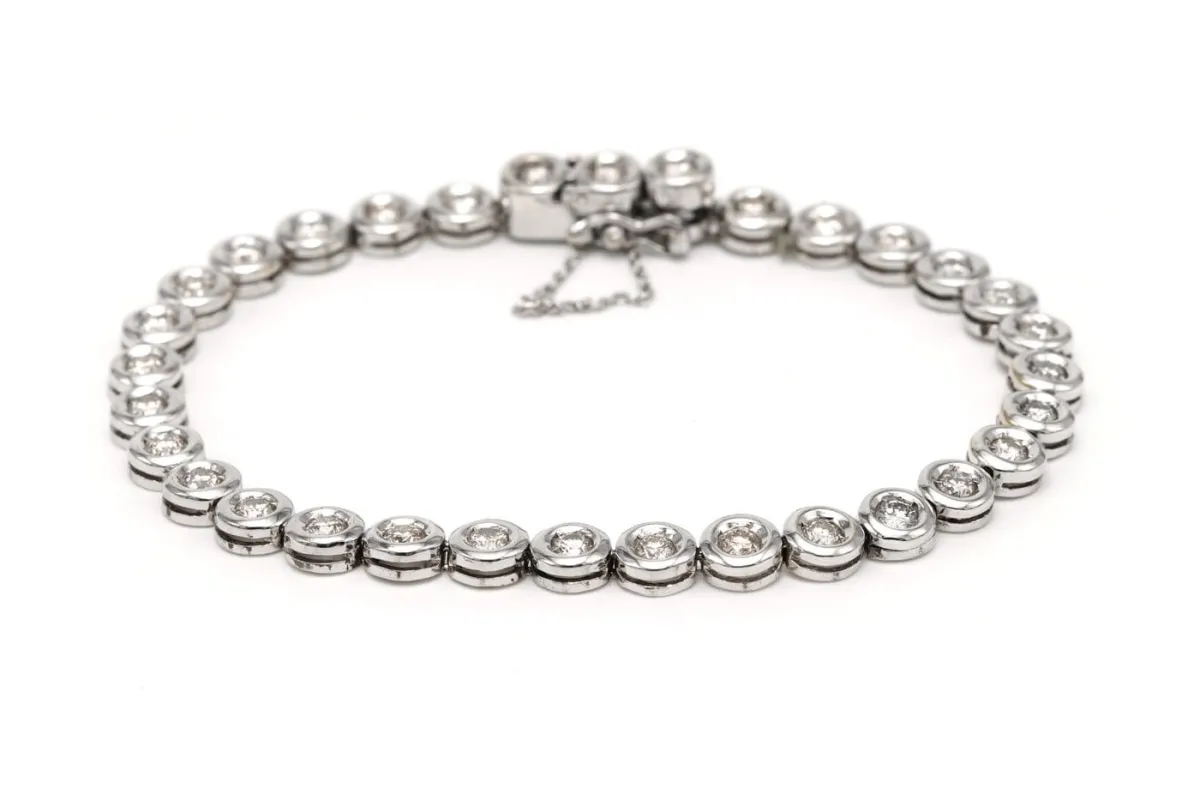 Bracelet contemporain en or blanc 18 carats serti de diamants taille brillant made by 58 Facettes