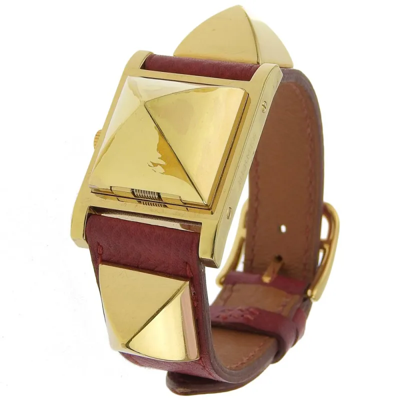 Hermès Medor - Montre quartz en métal plaqué or et cuir made by 58 Facettes