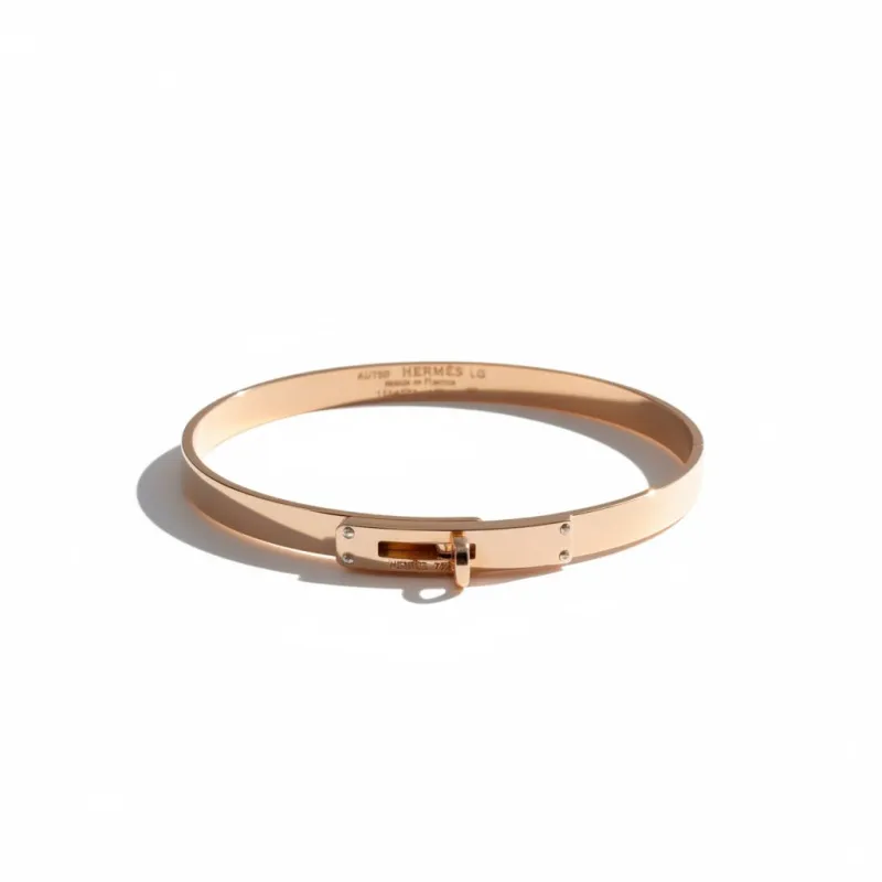 Hermès Kelly - Bracelet petit modèle en or rose et diamants made by 58 Facettes