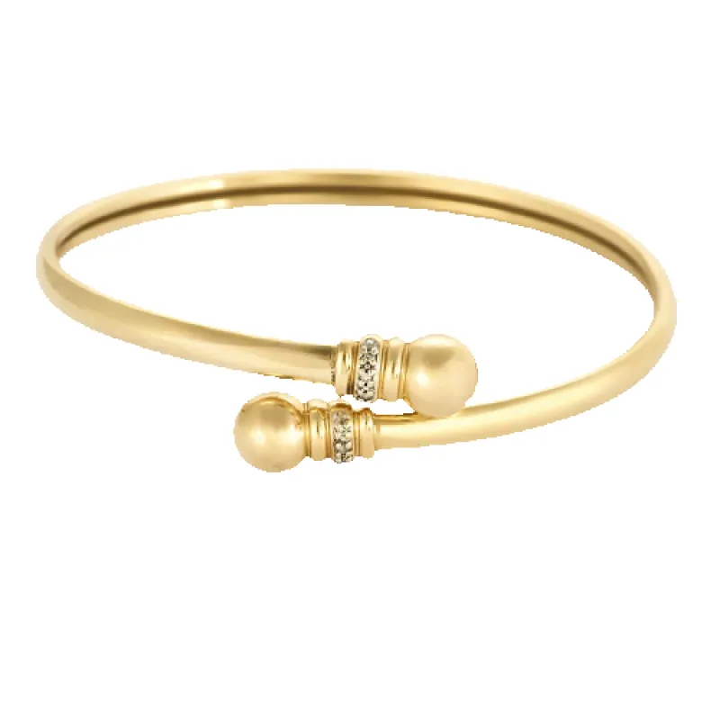 Bracelet jonc vintage croisé en or jaune 14k et diamants made by 58 Facettes