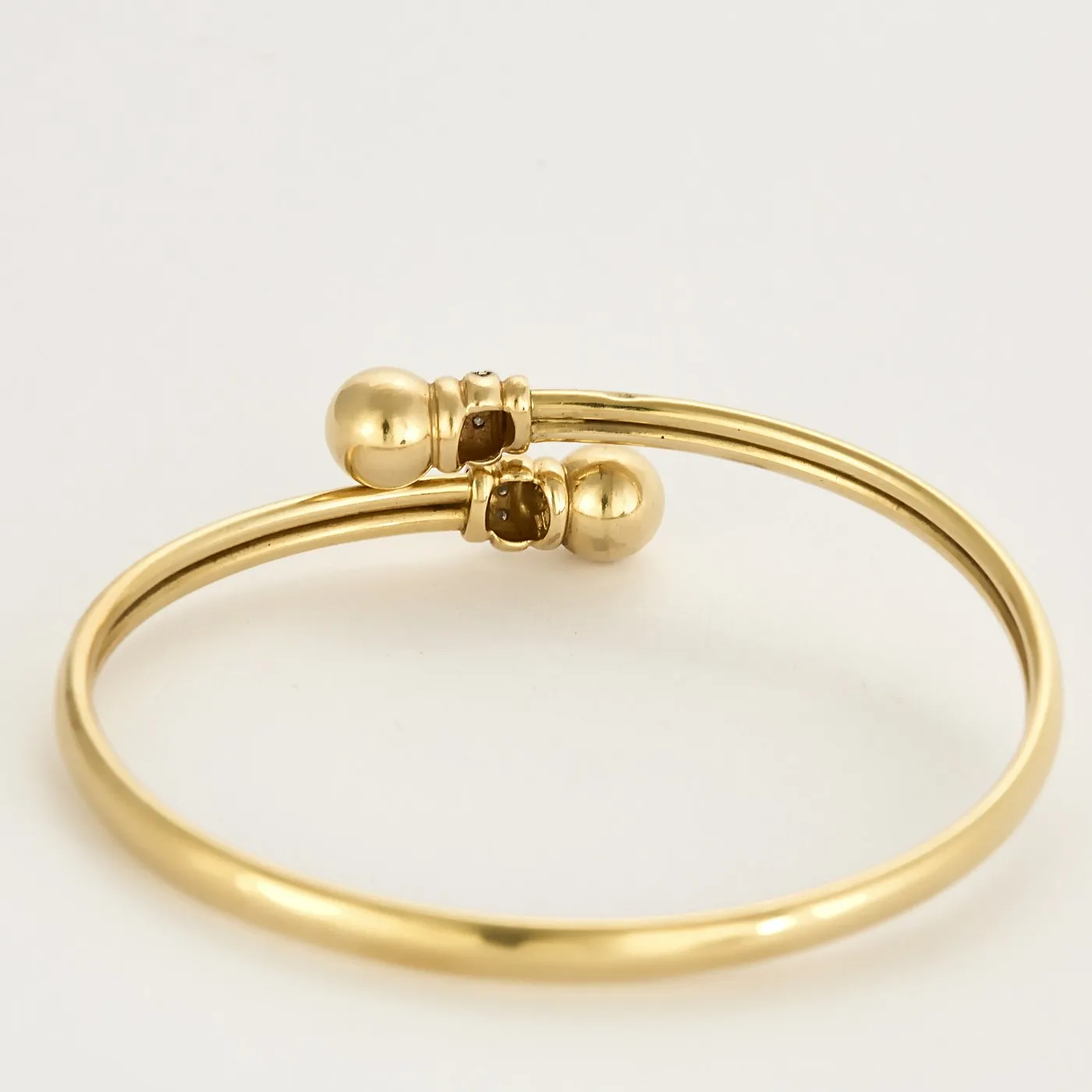 Bracelet jonc vintage croisé en or jaune 14k et diamants sold by 58 Facettes product image thumbnail 3