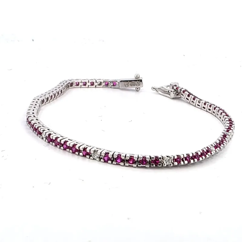 Bracelet tennis en or blanc 18 kt avec rubis et diamants made by 58 Facettes