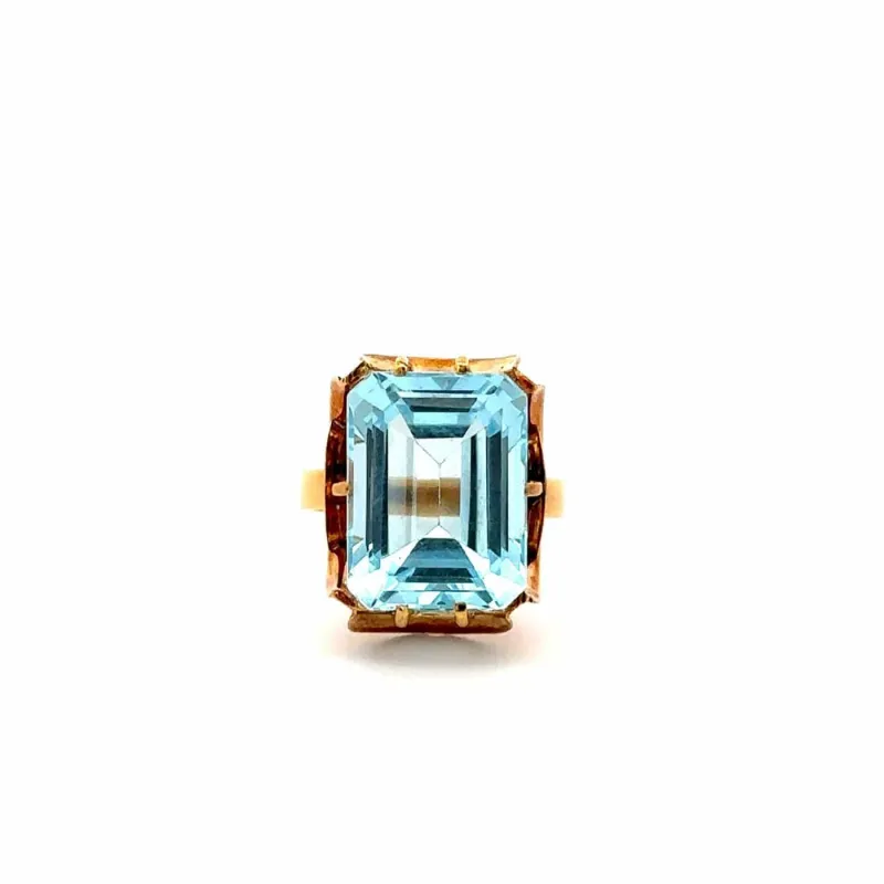 Bague en or jaune et topaze bleue made by 58 Facettes