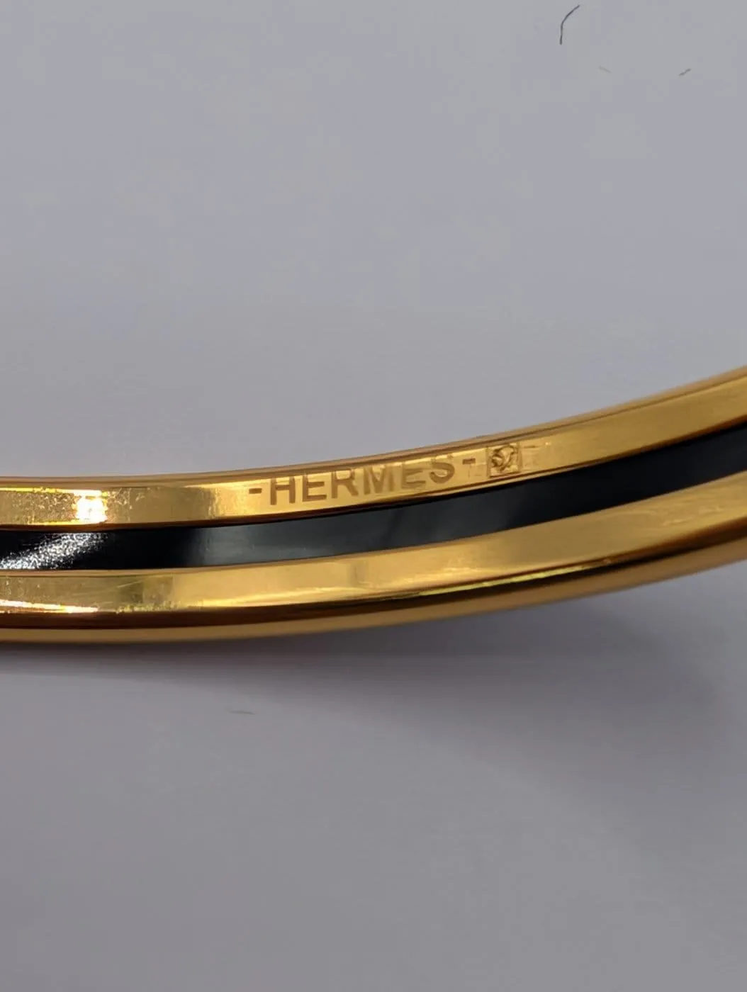 Hermès - Bracelet jonc en plaqué or et émail sold by 58 Facettes product image thumbnail 3