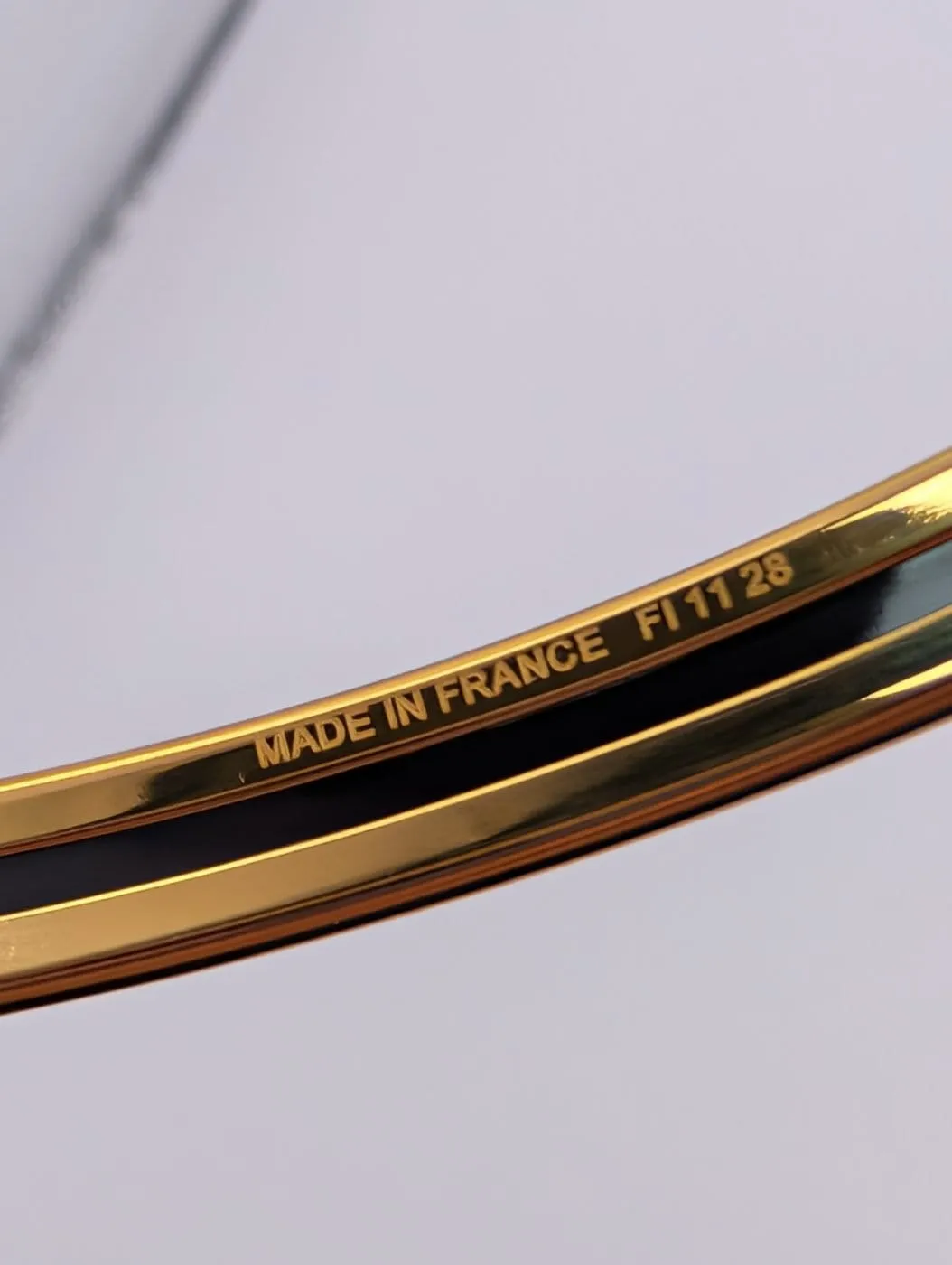 Hermès - Bracelet jonc en plaqué or et émail sold by 58 Facettes product image thumbnail 4