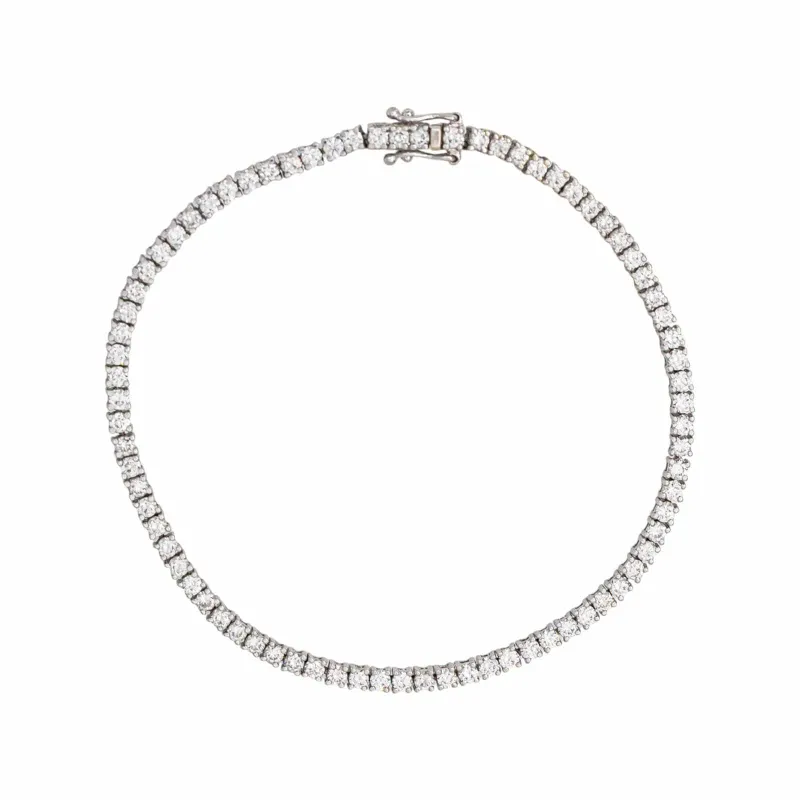 Bracelet tennis en or blanc et diamants made by 58 Facettes