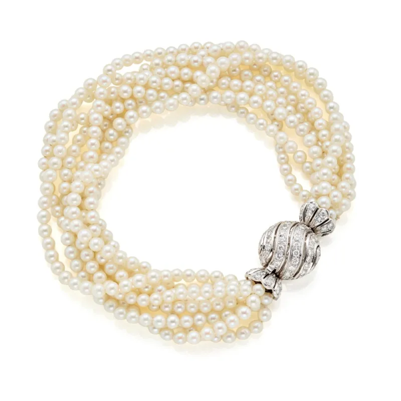 Bracelet torchon multifils en perles blanches, or blanc et diamants made by 58 Facettes