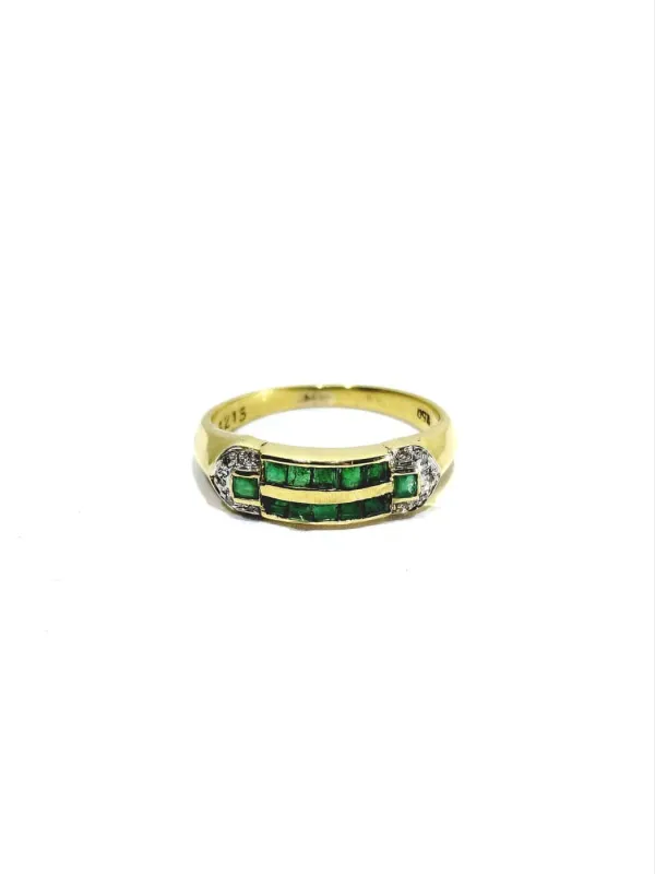 Bague en or jaune, diamants et émeraudes made by 58 Facettes