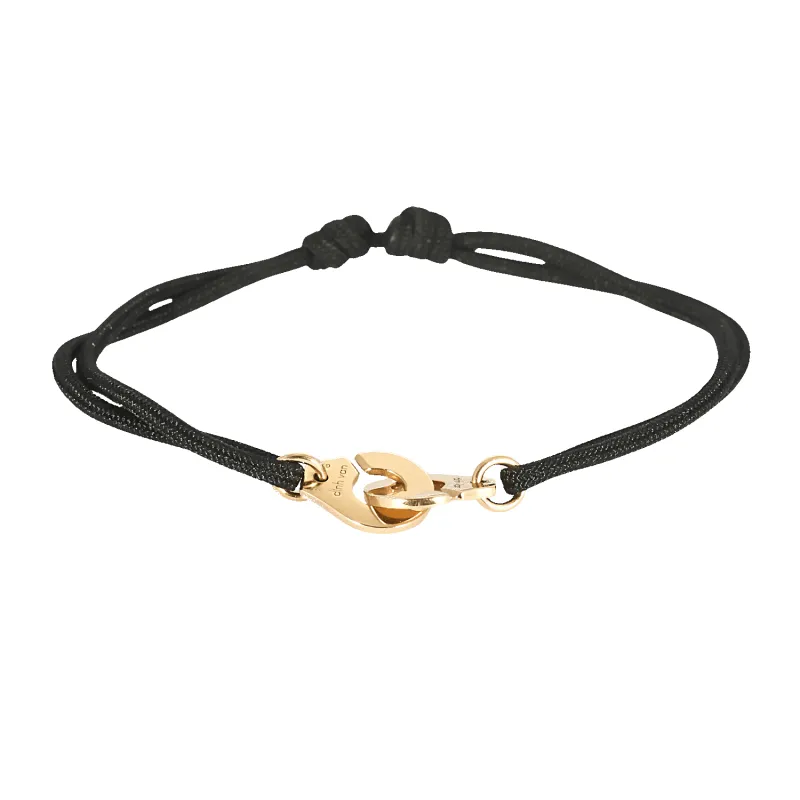 Dinh Van - Bracelet Menottes R10 en or rose et cordon noir made by 58 Facettes