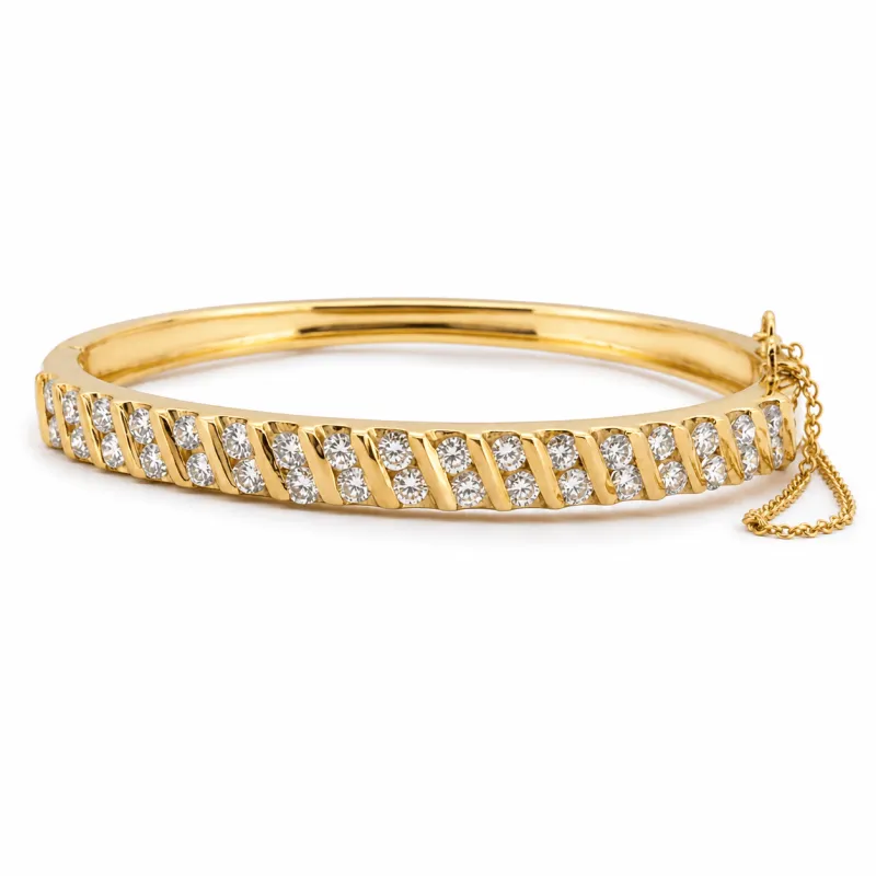 Bracelet jonc ouvrant en or jaune 18 carats et diamants made by 58 Facettes