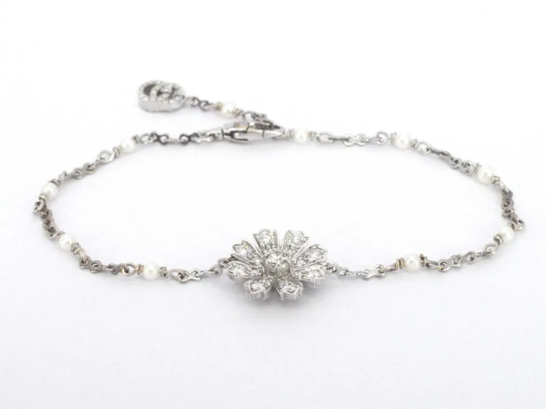 Gucci Flora - Bracelet en or blanc, diamants et perles made by 58 Facettes