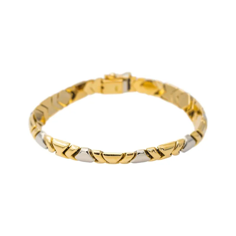 Bracelet en or jaune et or blanc made by 58 Facettes
