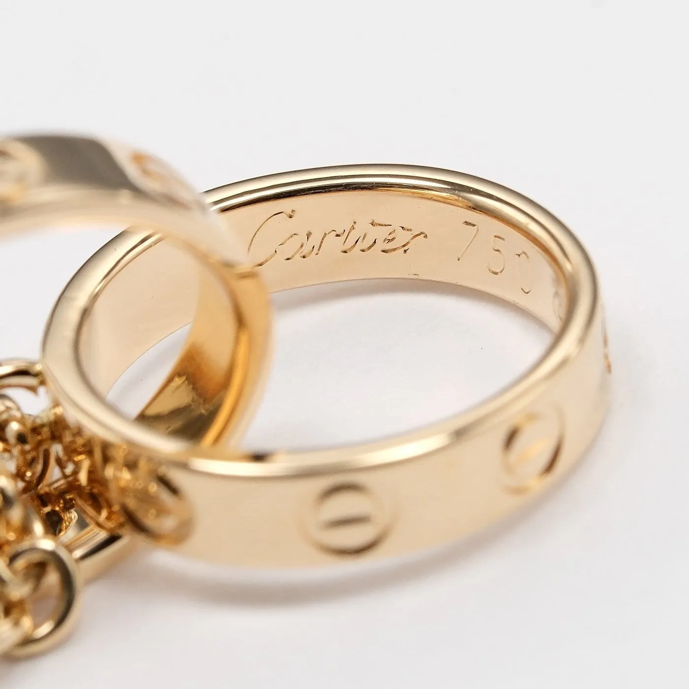Cartier Love Interlocking - Bracelet en or jaune 18K sold by 58 Facettes product image thumbnail 5