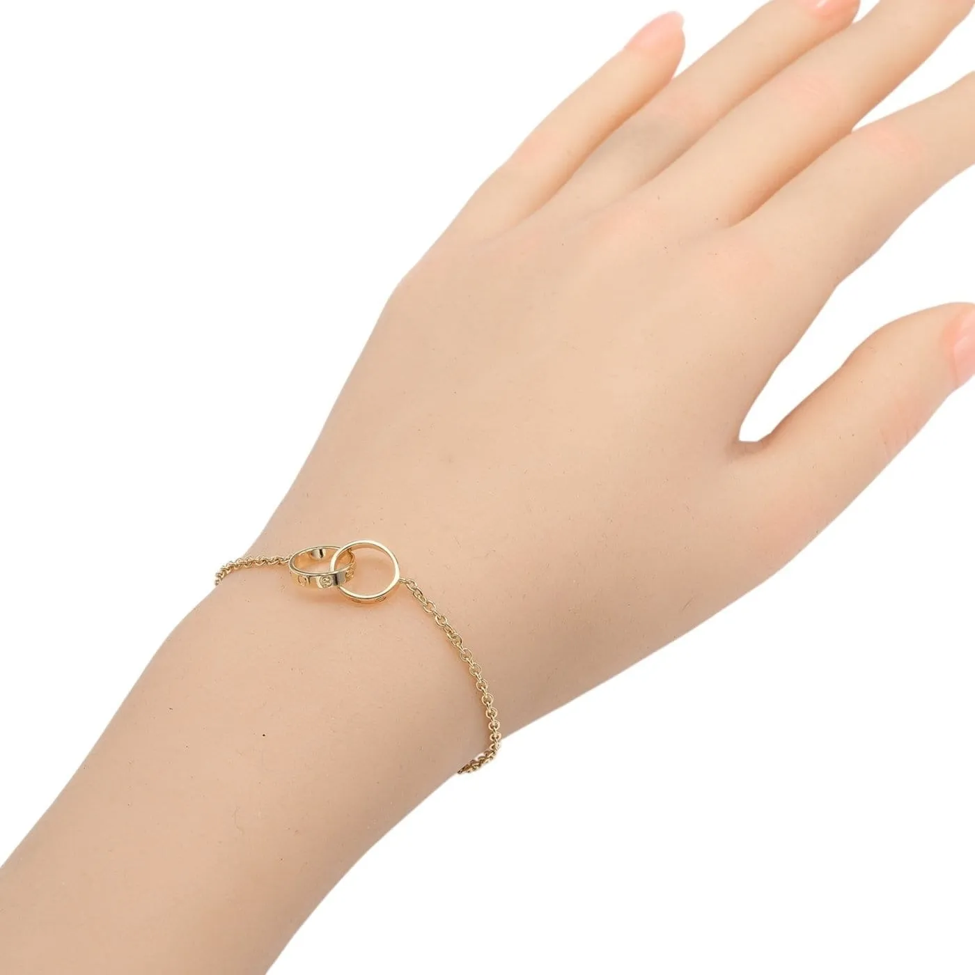 Cartier Love Interlocking - Bracelet en or jaune 18K sold by 58 Facettes product image thumbnail 2