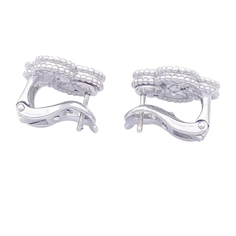 Boucles d'oreilles Van Cleef & Arpels "Vintage Alhambra" or blanc, diamants. sold by 58 Facettes product image thumbnail 4