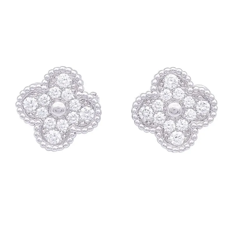 Boucles d'oreilles Van Cleef & Arpels "Vintage Alhambra" or blanc, diamants. made by 58 Facettes