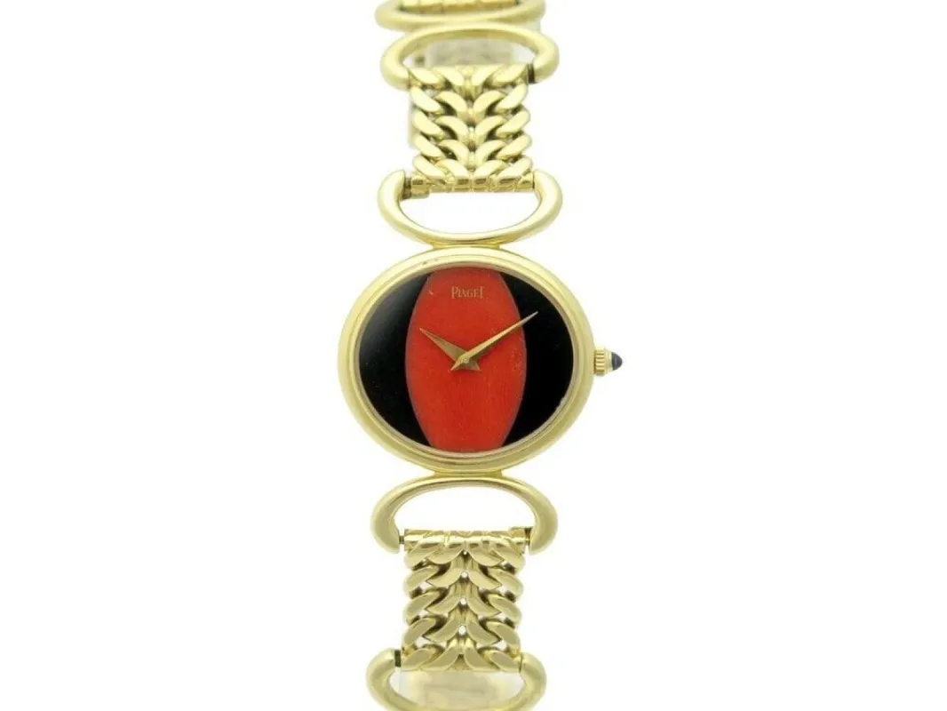 vintage montre PIAGET mecanique en or jaune onyx & corail sold by 58 Facettes