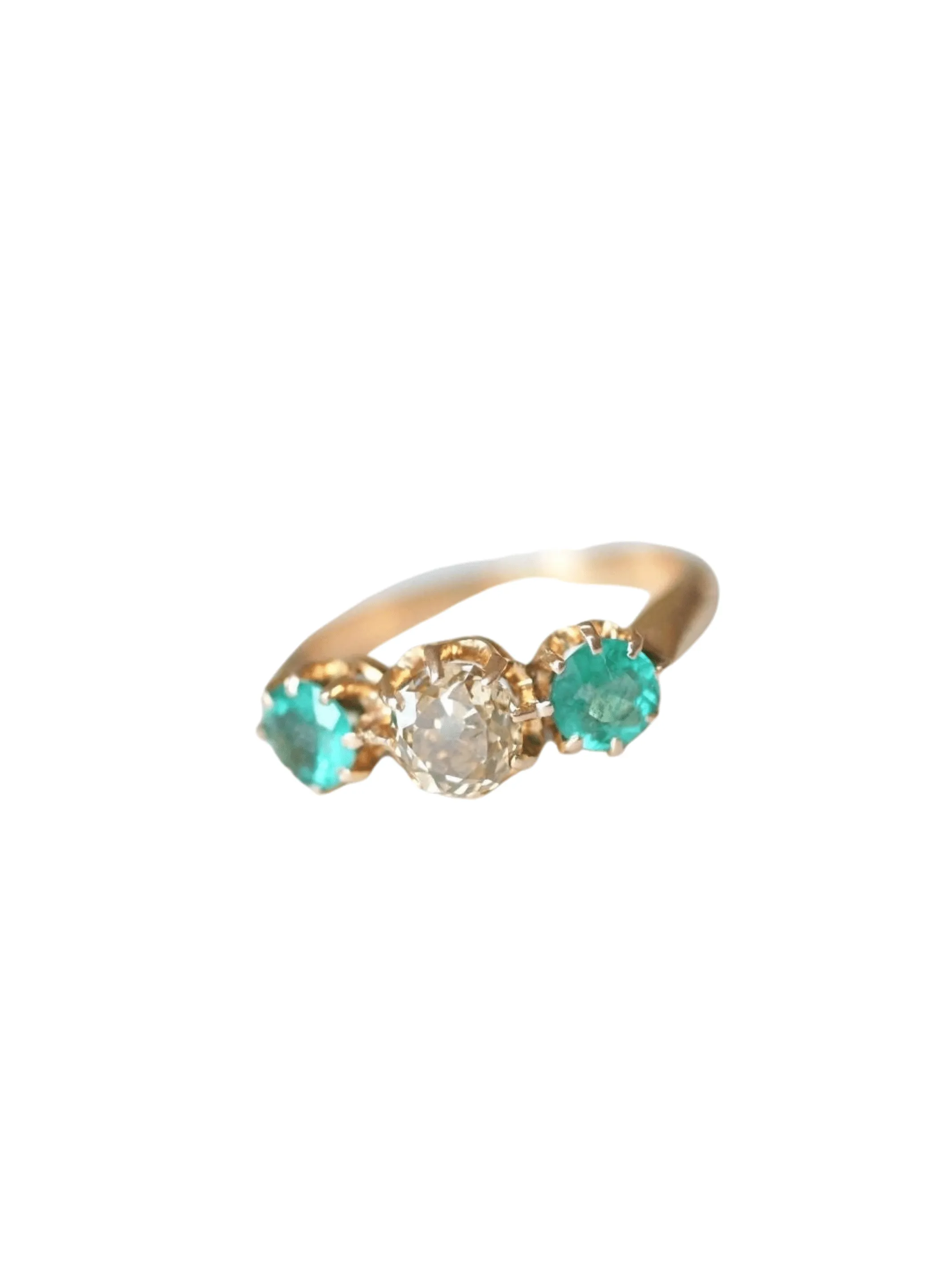 Bague jarretière or rose, émeraudes, et diamants sold by 58 Facettes