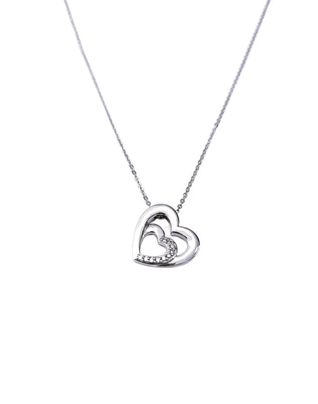 Collier pendentif cœur diamant or blanc sold by 58 Facettes