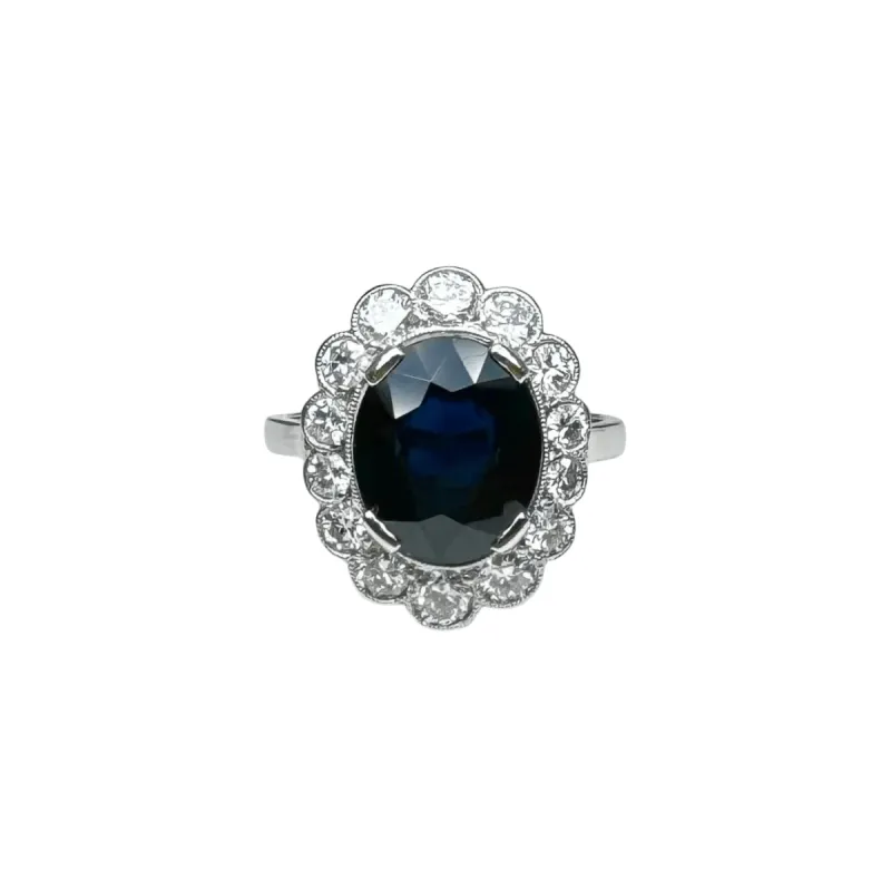 Bague marguerite platine saphir diamants sold by 58 Facettes