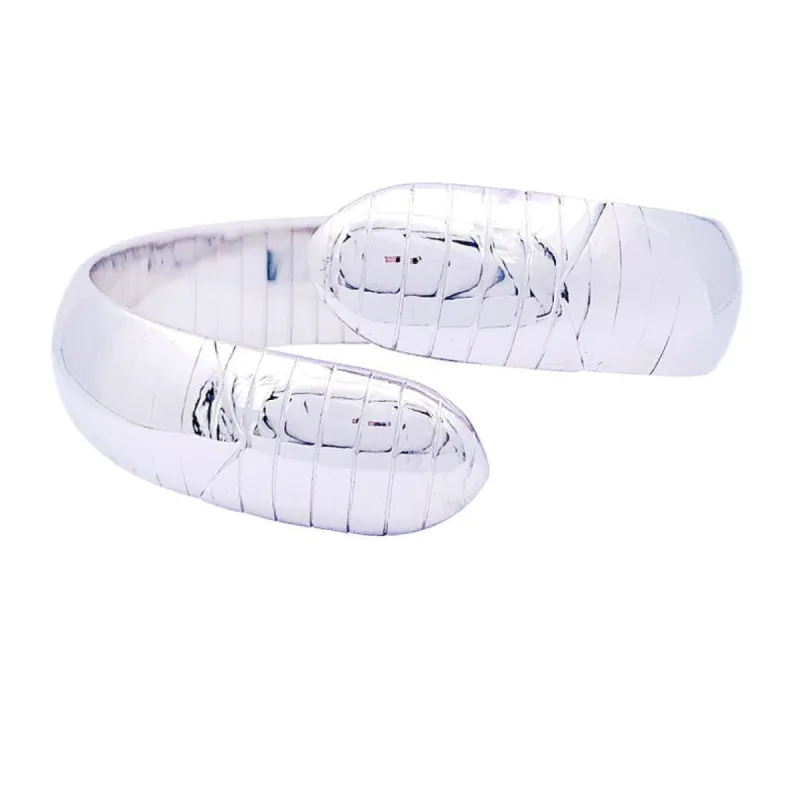 Bracelet Chaumet "Plume" or blanc. sold by 58 Facettes