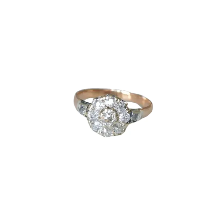 Bague marguerite or rose, platine et diamants sold by 58 Facettes