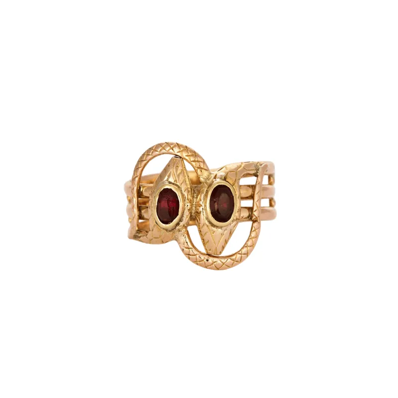 Bague or bicolore motif serpent et grenats sold by 58 Facettes