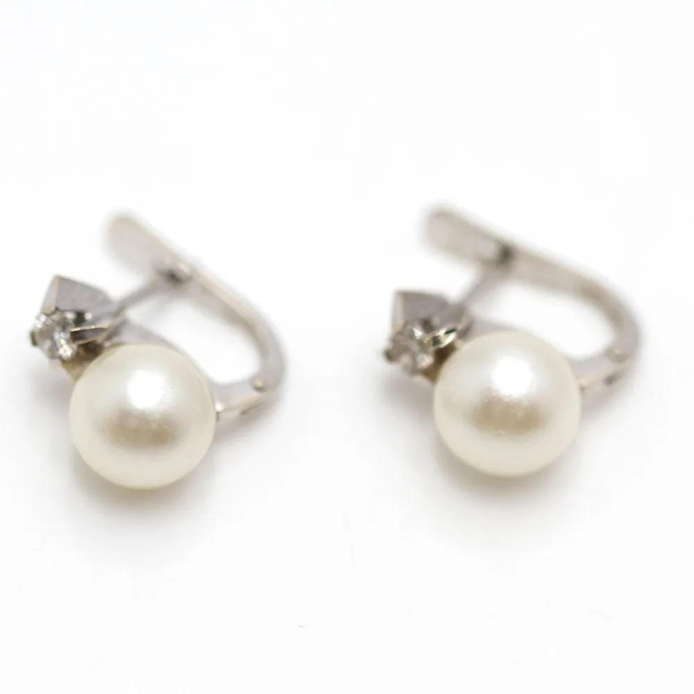 Boucles d'oreilles toi et moi en or avec perle et diamants sold by 58 Facettes