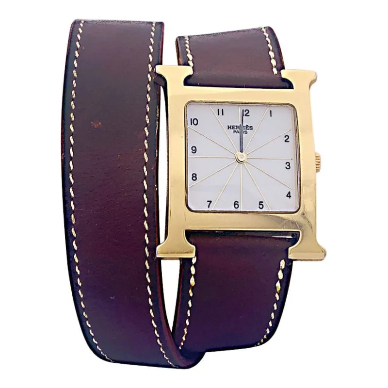 Montre Hermès, "Heure H", plaqué or, acier sur cuir. sold by 58 Facettes