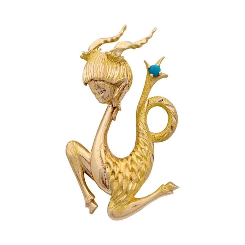 Broche vintage "Capricorne", or jaune, turquoise. sold by 58 Facettes
